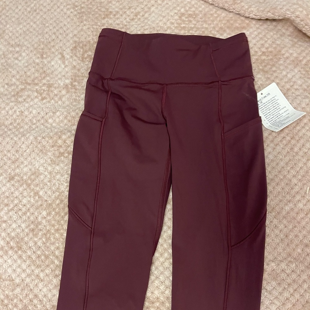 Lululemon leggings NWT in maroon/merlot color